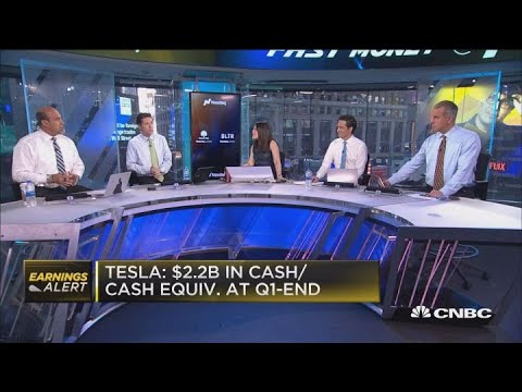 Tesla loses $2.90/share, revenue light, as well