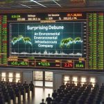 A high-definition, realistic image showing the display board of a stock market. The board highlights the surprising debut of an environmental infrastructure company, which has ignited the excitement of the investors.